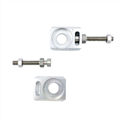 Silver aluminum axle blocks for Surron LBX, Talaria Sting, and E Ride Pro e-bikes by eDirtyBike, shown in the image.