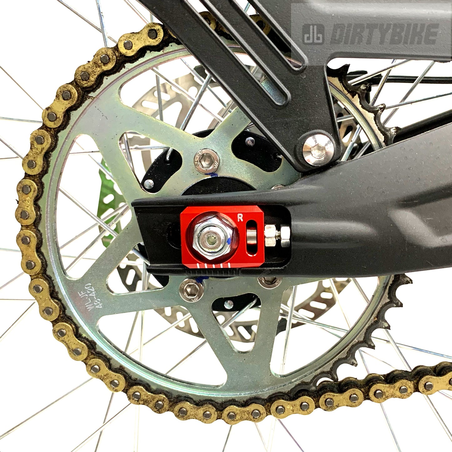 Aluminum axle blocks from eDirtyBike installed on a Surron LBX and Talaria Sting electric bikes, showing close-up of the axle area.