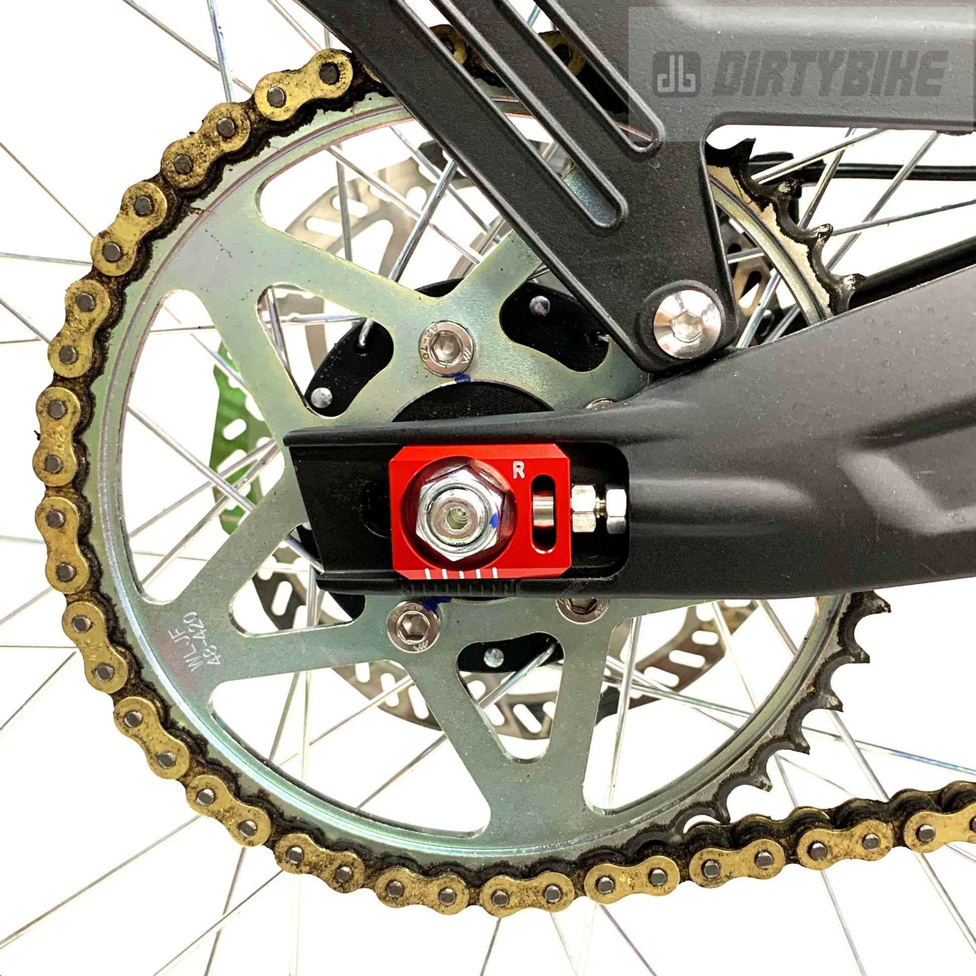 Aluminum axle blocks from eDirtyBike installed on a Surron LBX and Talaria Sting electric bikes, showing close-up of the axle area.