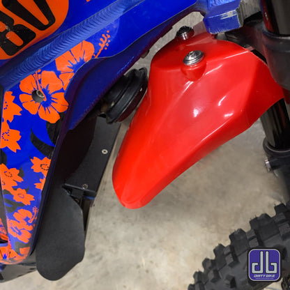 eDirtyBike high front fender mounting kit installed on Surron LBX and Talaria Sting electric bikes, showcasing durable fender attachment.