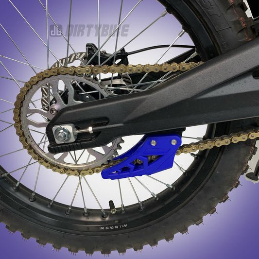 eDirtyBike Talaria Sting chain guide kit for MX3 and MX4 models, mounted on a dirt bike showing the guide's design and installation.