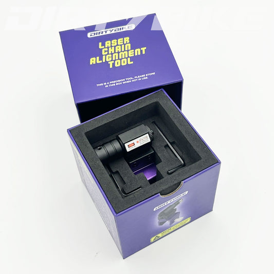 eDirtyBike laser chain alignment tool for motorcycles, showing precise laser lines for accurate chain alignment.