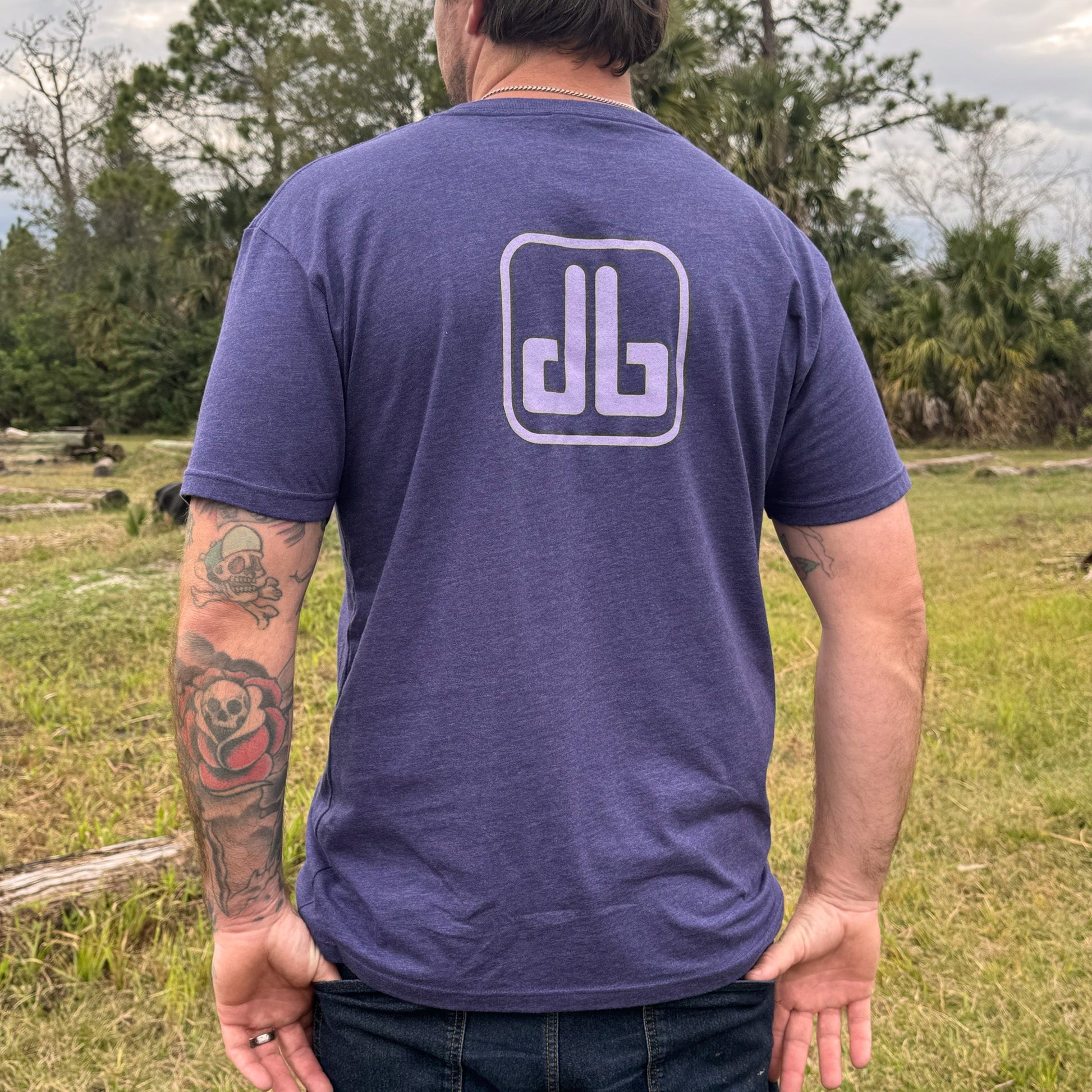 Purple eDirtyBike short sleeve T-shirt displayed from the back, featuring a casual fit and brand logo on the upper back.