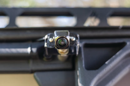 QuadBoss 360 camera system with HD cameras and wireless control for powersports vehicles, shown mounted on a vehicle.