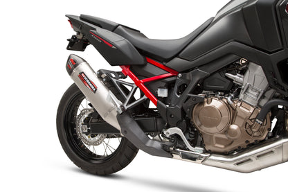 YOSHIMURA RS-12 slip-on exhaust for off-road vehicles, showing the stainless steel muffler with branding and mounting details.