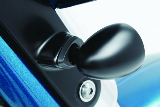 Kuryakyn Kellermann front turn signal mounts for Harley Davidson Street Glide, showing sleek black mounting brackets on motorcycle fairing.