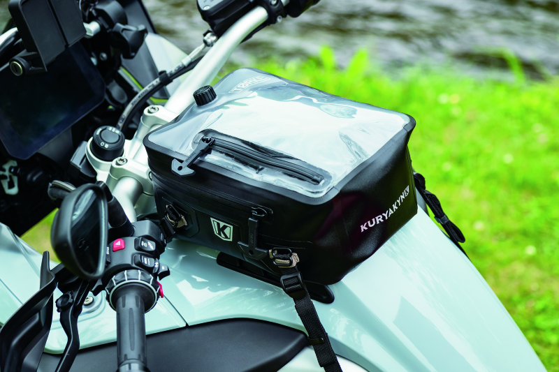 Kuryakyn Torke 7L dry tank bag with backpack straps, waterproof design, mounted on motorcycle tank for secure storage.