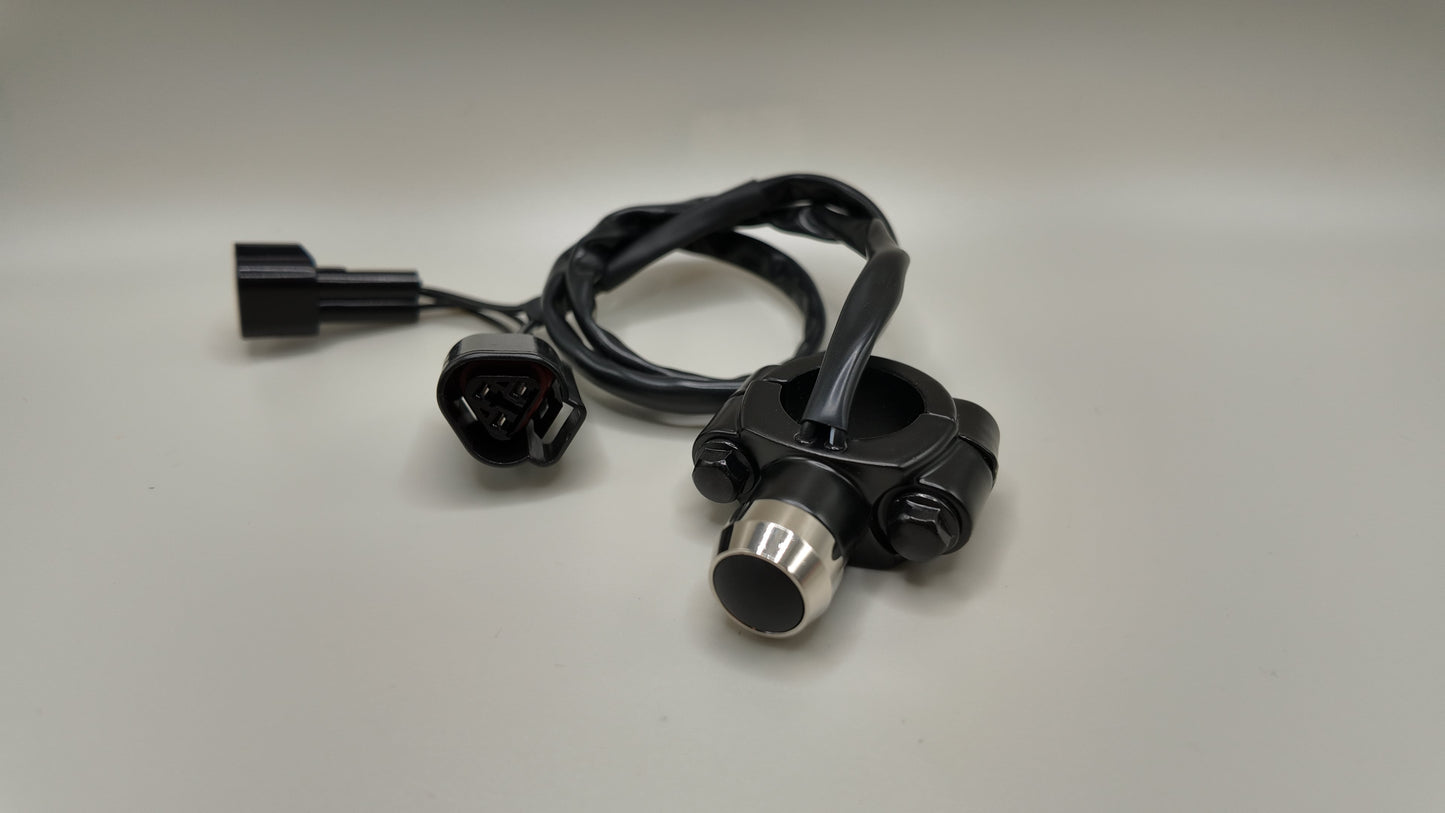Project9 Eride Pro rear tail light and underglow switch on a motorcycle handlebar, showing the switch and wiring.
