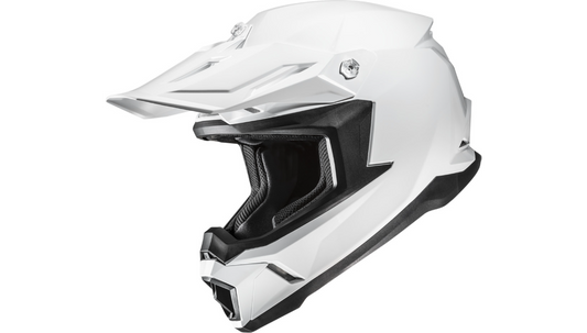 HJC C50 Solid motorcycle helmet in lightweight polycarbonate with full-face design, shown in a sleek black color.