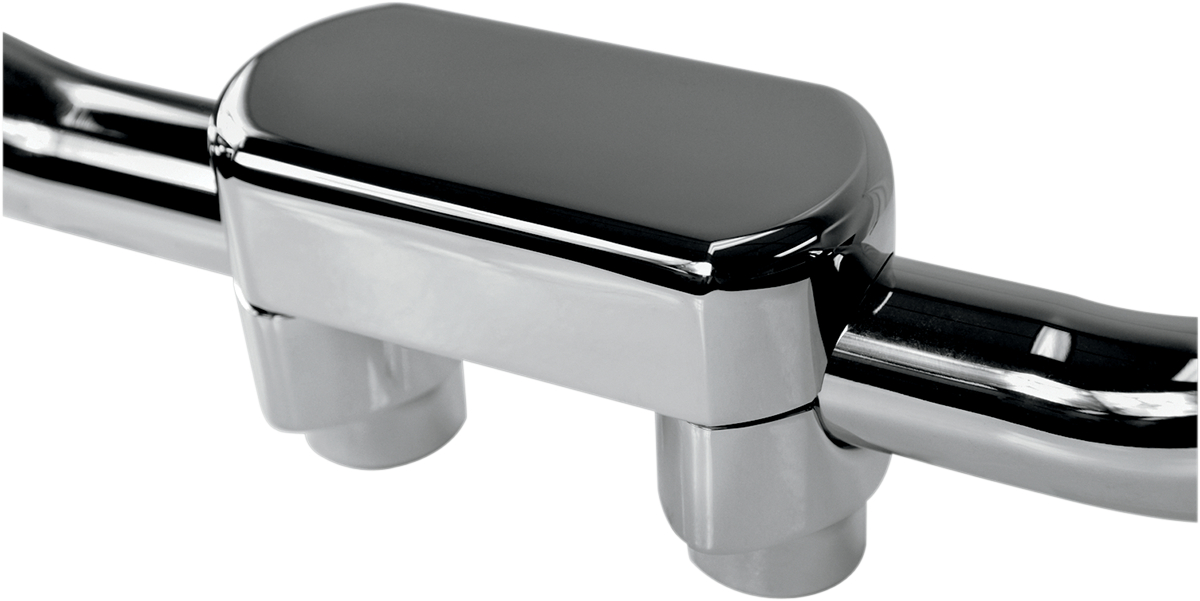 Chrome handlebar riser and top clamp kit by Drag Specialties for 1-1/2 inch handlebars, includes riser and clamp components.