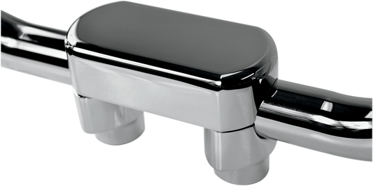 Chrome handlebar riser and top clamp kit by Drag Specialties for 1-1/2 inch handlebars, includes riser and clamp components.