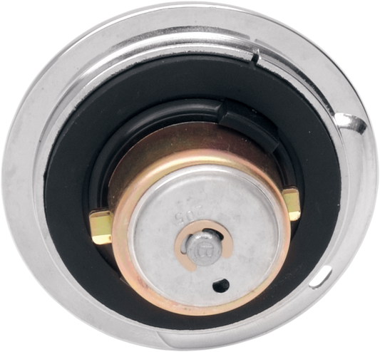 Drag Specialties locking vented flush-mount gas cap showing its sleek design and secure locking mechanism for motorcycle fuel tanks.
