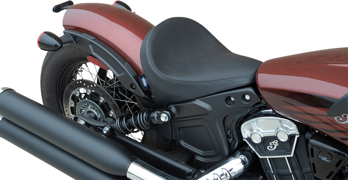 Black vinyl 3/4 solo seat by Drag Specialties Seats, designed for motorcycle comfort and style.