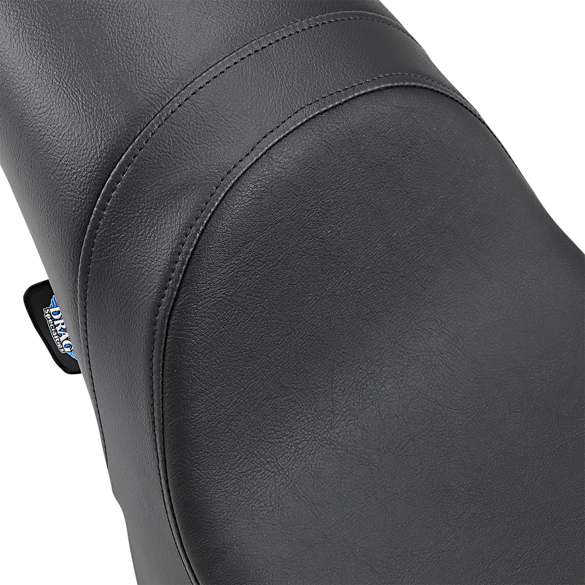 Drag Specialties Predator Seat for Harley FLST/FXST 1984-1999, smooth black motorcycle seat with durable, comfortable design.