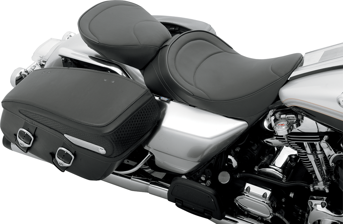 Drag Specialties solo seat with driver backrest for FLH 1997-2007, featuring mild stitched upholstery and durable construction.