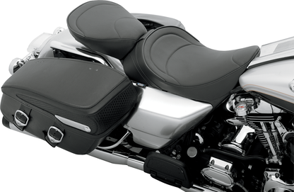 Drag Specialties solo seat with driver backrest for FLH 1997-2007, featuring mild stitched upholstery and durable construction.