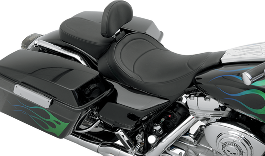 Drag Specialties solo seat with driver backrest for FLT 97-07, featuring mild stitching and ergonomic design.