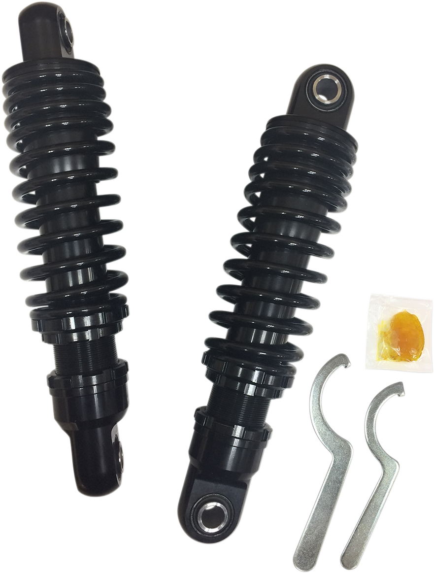 Drag Specialties shocks for Harley-Davidson, black 10.5-inch premium motorcycle shocks with coil spring for enhanced ride quality.