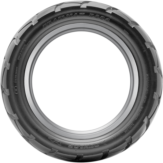 Dunlop D604 rear motorcycle tire 130/70-12 62L designed for highway and off-road riding, with tread pattern visible.
