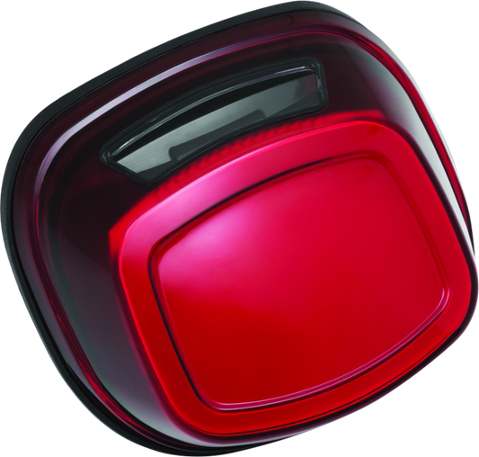 Kuryakyn Tracer LED taillight with red lens and license plate light for Harley Davidson motorcycle.