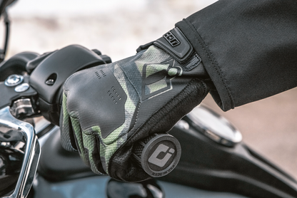 Open box Bill's Exhausts ICON Hooligan™ Battlescar gloves in green, medium size, with rugged design and protective features.