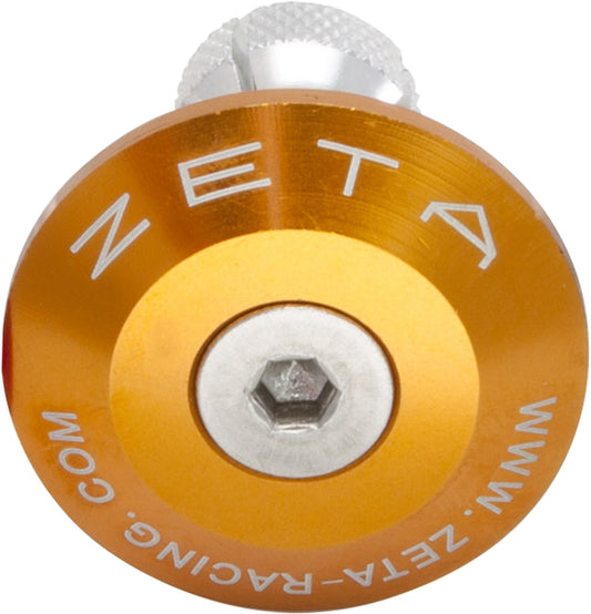 Gold ZETA ZETA motorcycle handlebar end plug caps, lightweight aluminum bar end caps with a sleek finish.