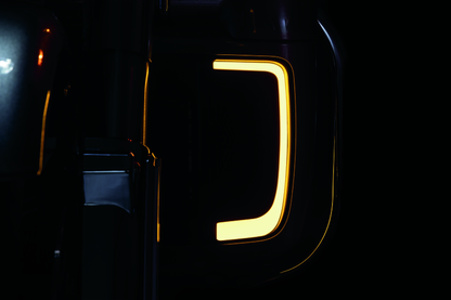 Black Kuryakyn Tracer Lower Fairing Grill for Harley Davidson Touring models, showcasing durable motorcycle accessory design.