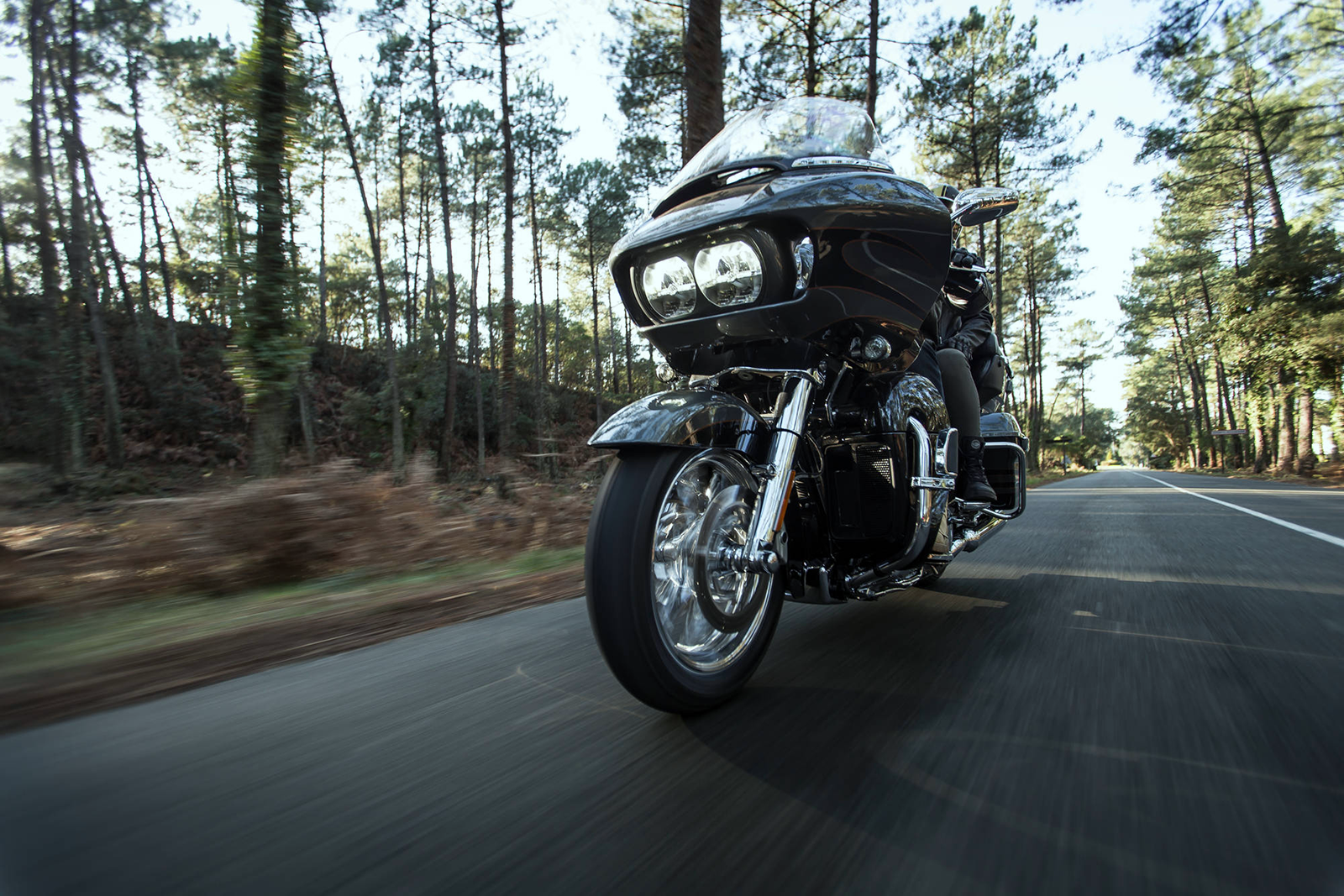Michelin Scorcher 11 front motorcycle tire, 120/70ZR19 size, mounted on wheel, showing tread pattern and sidewall details.