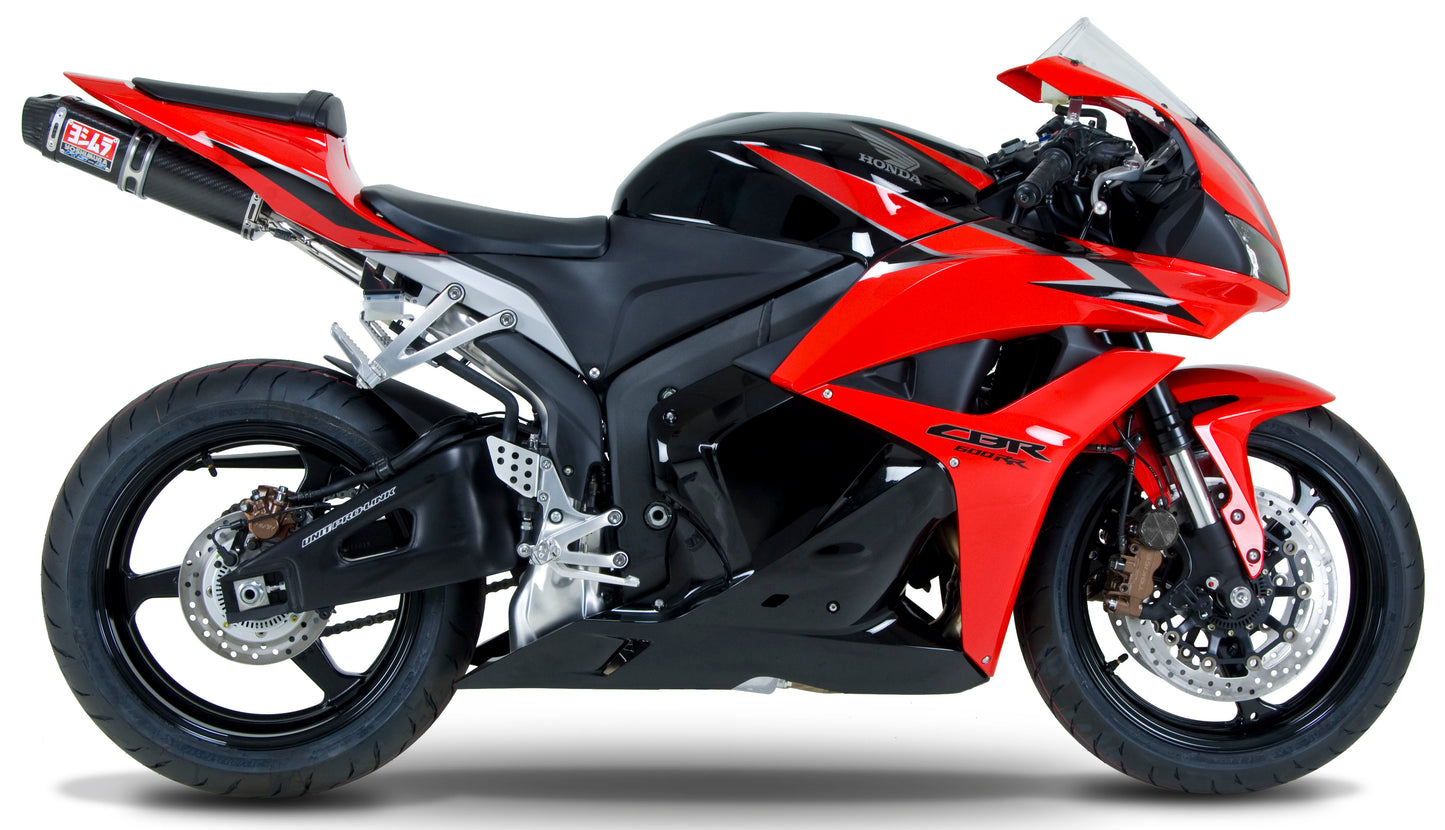 YOSHIMURA RS-5 slip-on SS CF exhaust for UTVs, showing the stainless steel and carbon fiber finish with mounting hardware.