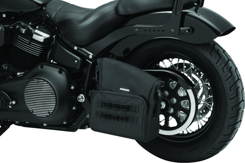 Kuryakyn Hoodrat Universal Swingarm Bag mounted on powersports motorcycle swingarm with durable black design