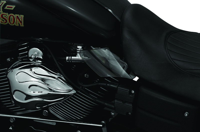 Kuryakyn Saddle Shields heat deflectors installed on a Dyna motorcycle, providing rider protection from heat on the seat area.