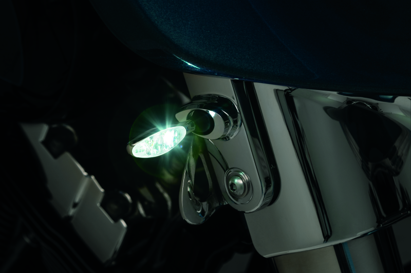 Chrome Kuryakyn Kellermann front turn signal mounts for Harley Davidson FLHX models, showcasing sleek motorcycle lighting accessories.