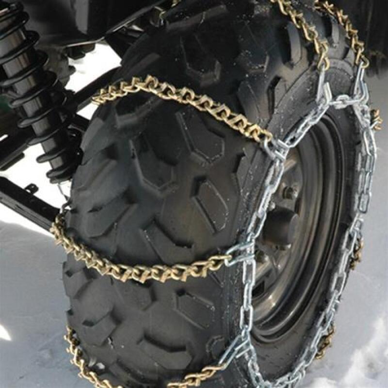 QuadBoss XL tire chain with V-Bar design installed on large tires, showing rugged metal links and secure fit.