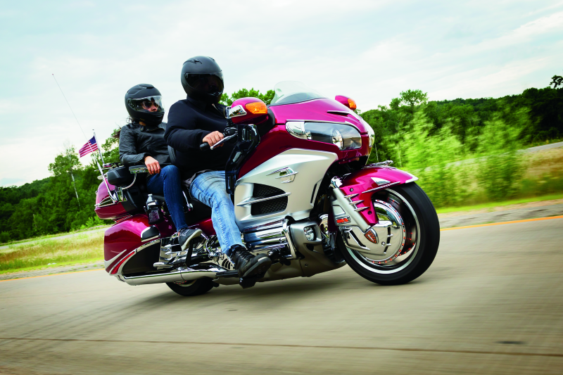 Kuryakyn passenger drink holder for Honda GL1800 Gold Wing, chrome finish, mounted on bike handlebar or passenger area