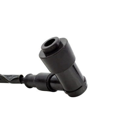 RM STATOR external ignition coil with spark plug cap, part RM06001, showing the coil and attached spark plug cap.