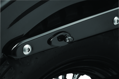 Kuryakyn Fender Strut Cover Plates for Harley-Davidson motorcycles, designed to enhance the rear fender appearance.