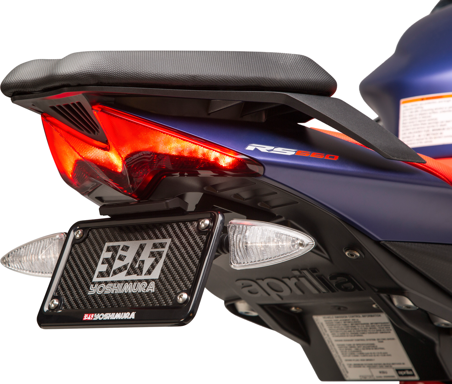 YOSHIMURA Fender Eliminator Kit for motorcycle, showing sleek black tail tidy with mounting hardware and compact design.