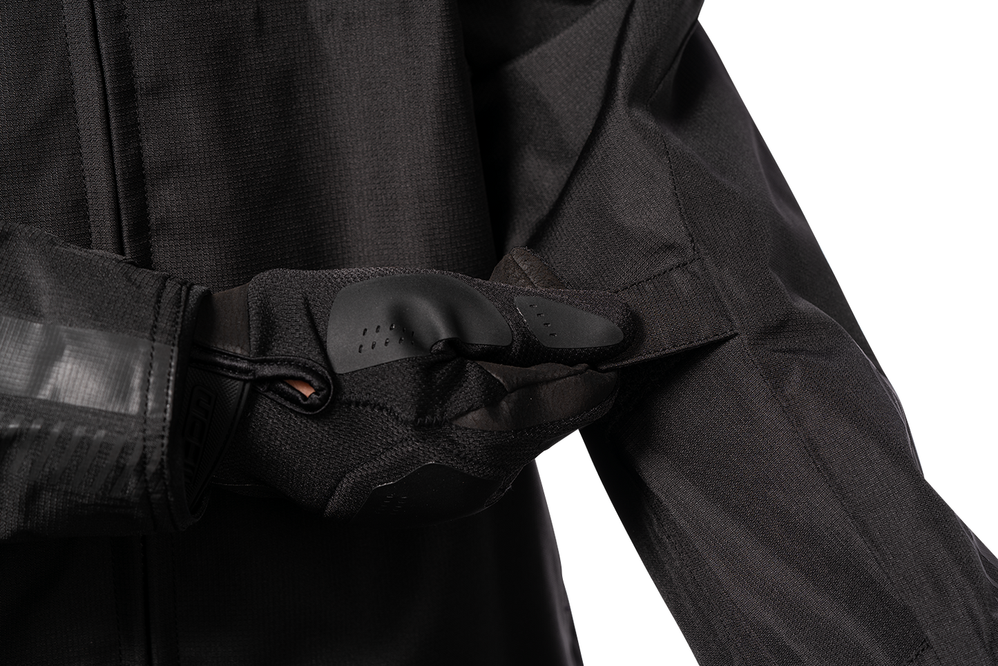 Black ICON PDX3™ Jacket in XL size, displayed on a hanger, showing its sleek design and front zipper.