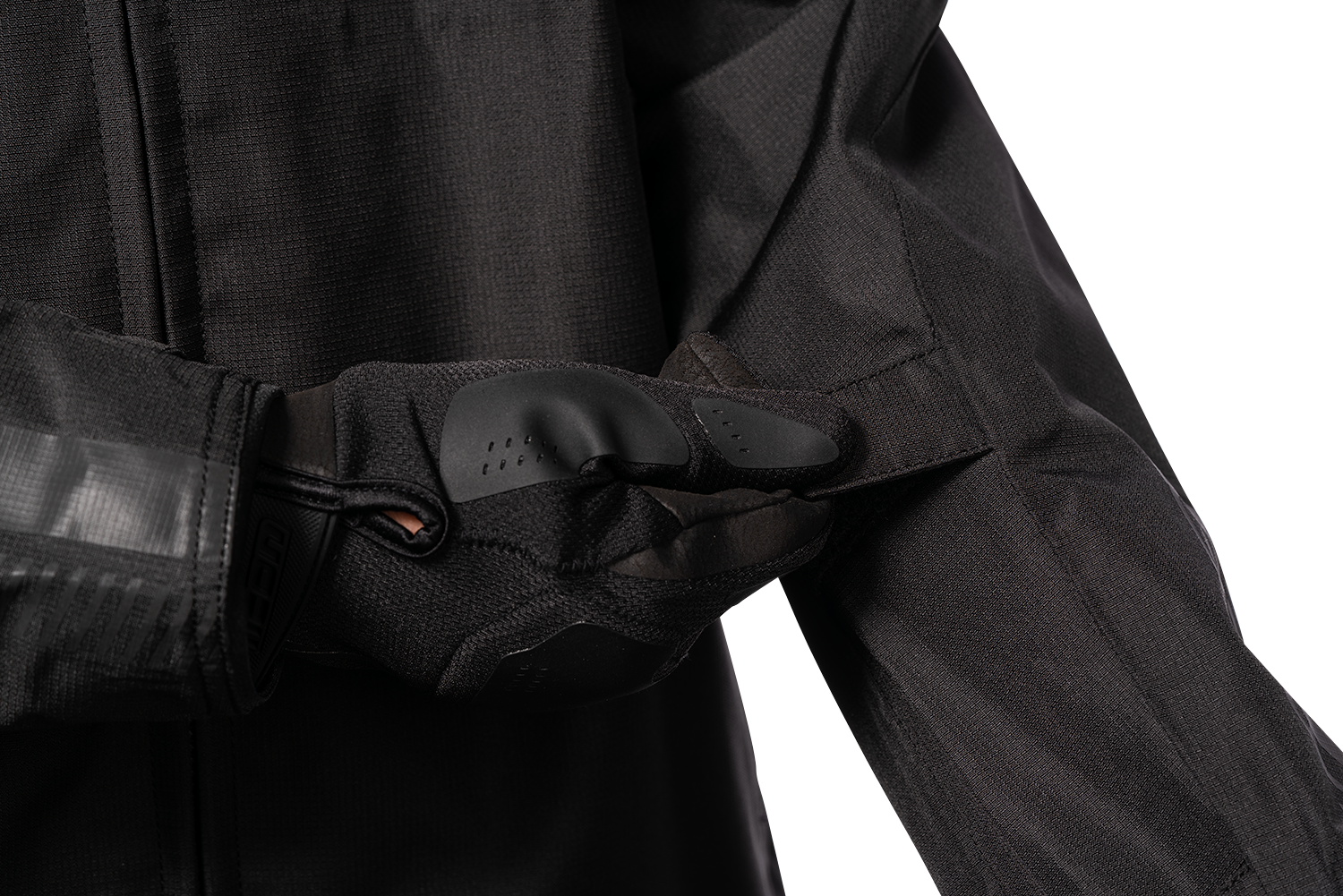 Black ICON PDX3™ Jacket in XL size, displayed on a hanger, showing its sleek design and front zipper.