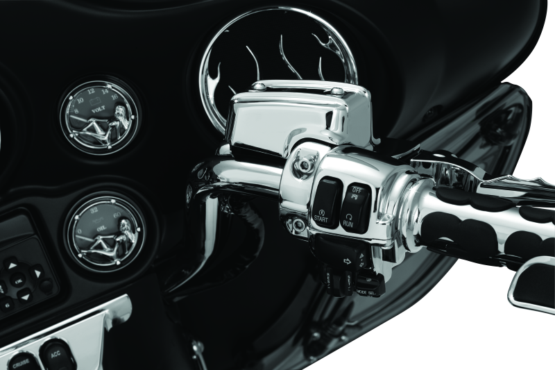 Kuryakyn chrome handlebar control dress-up kit for Harley Davidson Touring models, featuring polished metal accents on handlebar controls.