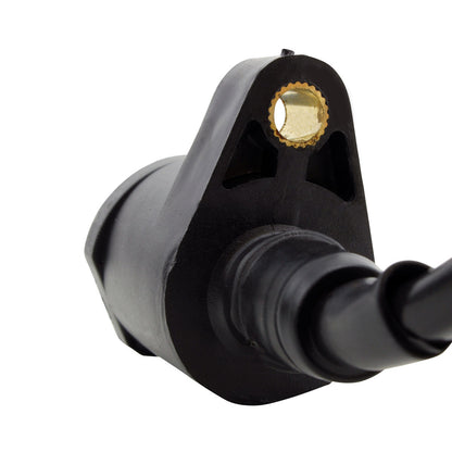 RM STATOR external ignition coil with spark plug cap, showcasing the coil's compact design and connection points.