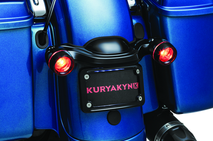 Kuryakyn curved license plate mount for Harley-Davidson Street Glide and Road Glide, part #3147, shown on motorcycle rear.