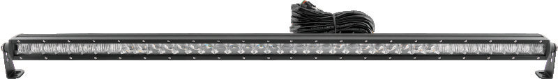 QuadBoss 31.5-inch single row LED light bar with combo beam, mounted on vehicle for enhanced off-road visibility.