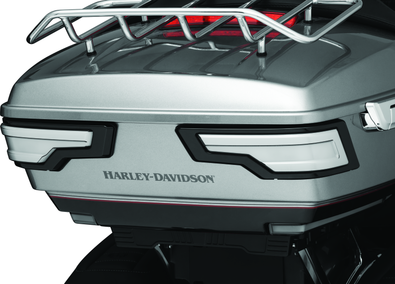 Kuryakyn Tracer Tour Pak rear lights with black smoke lens on motorcycle, showcasing sleek LED design and dark tinted cover.