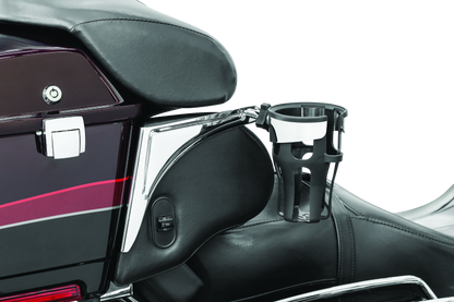 Chrome Kuryakyn Reflex Drink Holder for Harley-Davidson Touring Models attached to motorcycle handlebar.