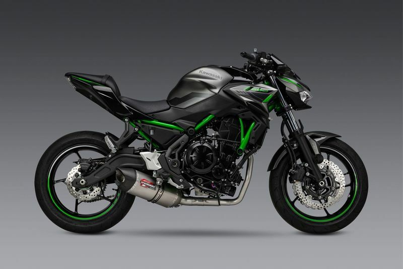 YOSHIMURA Race AT2 exhaust with stainless steel and carbon fiber components, featuring sleek design and metal finish.