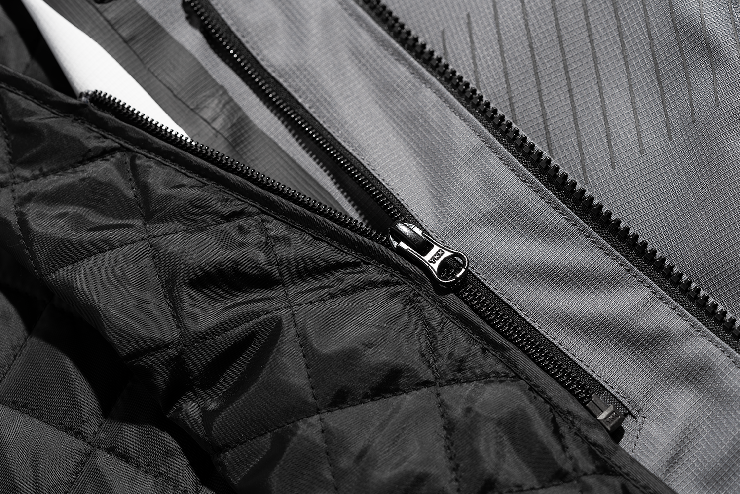 Gray ICON PDX3™ jacket by Bill's Exhausts, large size, shown with front zipper and collar details.