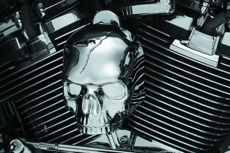 Chrome Kuryakyn Skull Horn Cover with Waterfall Style Horn for Harley-Davidson motorcycles, fits 2017 and up models.