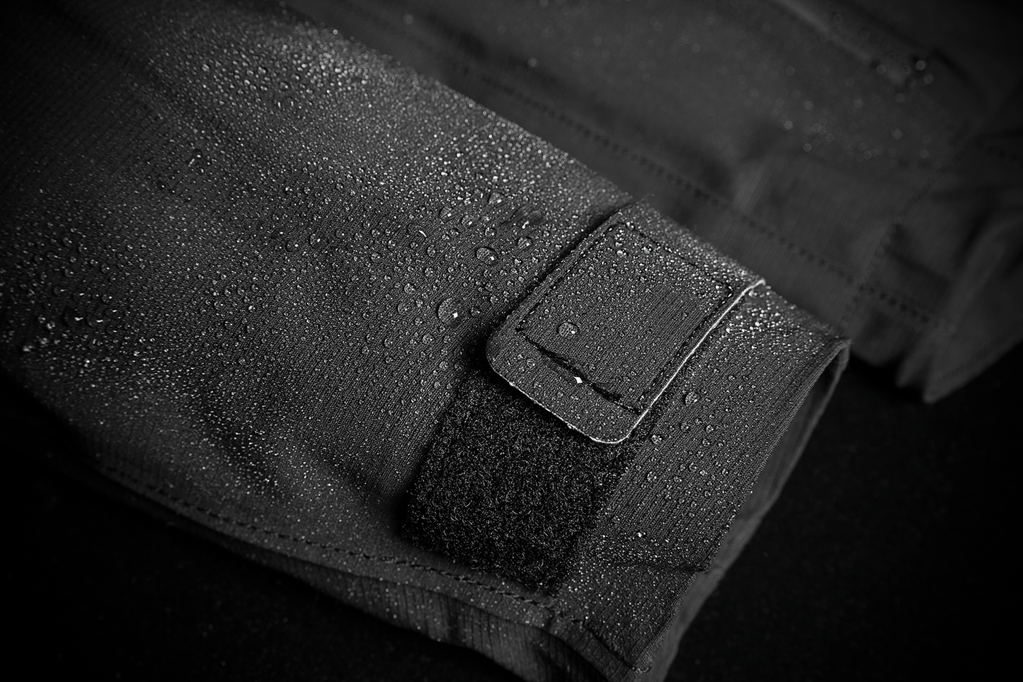 Black ICON Stormhawk Jacket CE in XL size, featuring durable material and protective design, displayed on a hanger.