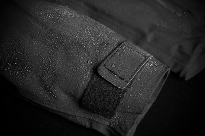 Black ICON Stormhawk Jacket CE in XL size, featuring durable material and protective design, displayed on a hanger.